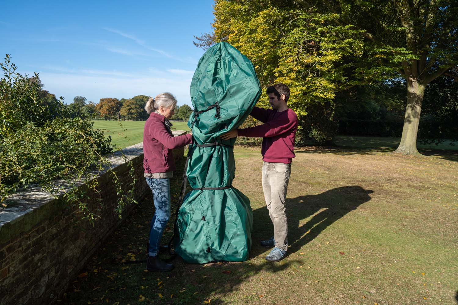 Winter Covers Cliveden Conservation Winter Covers being fixed into place.