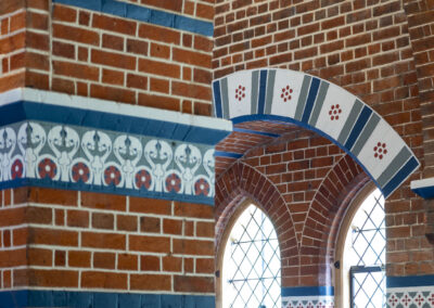 The internal brickwork was repaired and the decorative scheme reinstated.