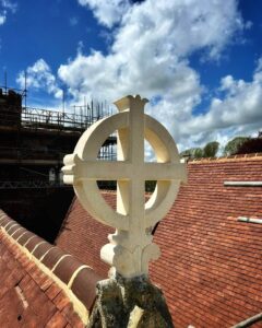 New roof finial crosses were hand carved by Cliveden Conservation for the restored church tower.