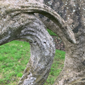 Close up of cracked stone on decorative stonework.