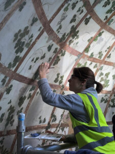 Retouching of decorative painted ceiling