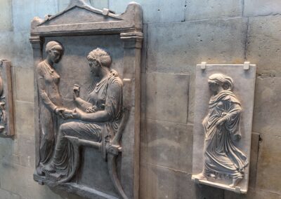 Plaster reliefs fixed onto a wall.