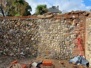 Flint wall with a repaired section