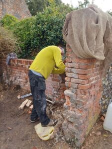 Relaying brick wall