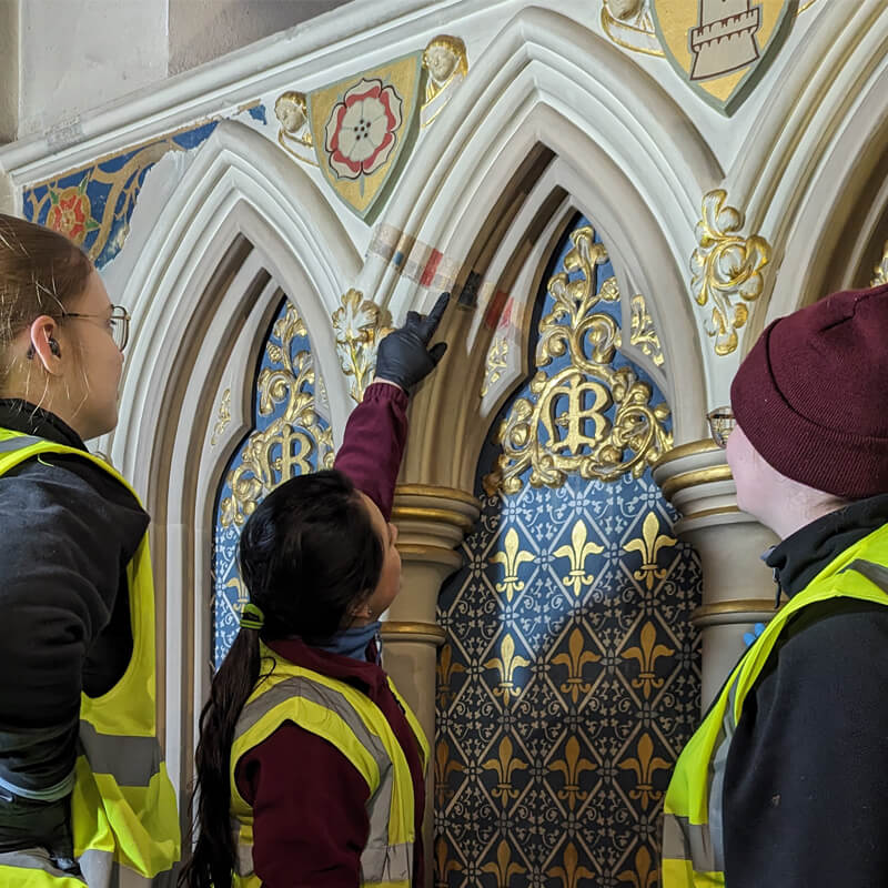 Conservators looking at the Pugin Decorative Scheme at Nottingham Cathedral